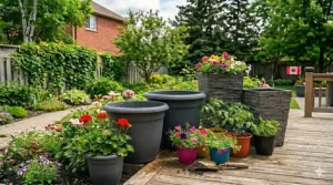 Tall square plastic planters for modern balcony decor. / Jardinières hautes en plastique pour balcons modernes.